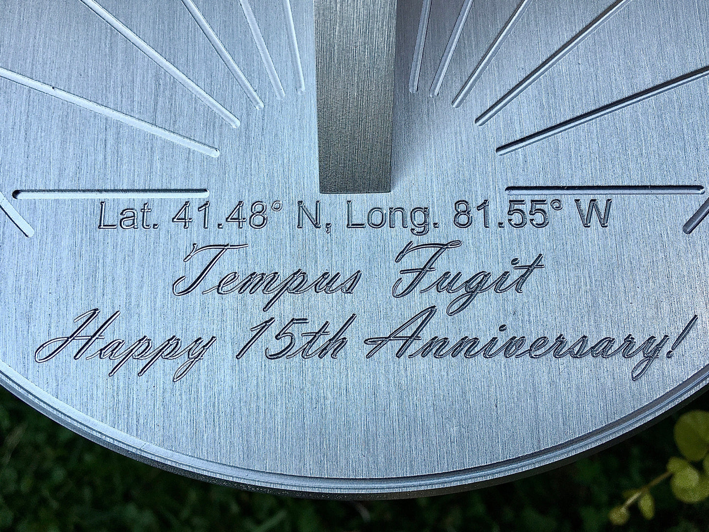 15 year wedding anniversary gift for husband sundial on grass in a garden, displayed as 15 year anniversary gift for husband.