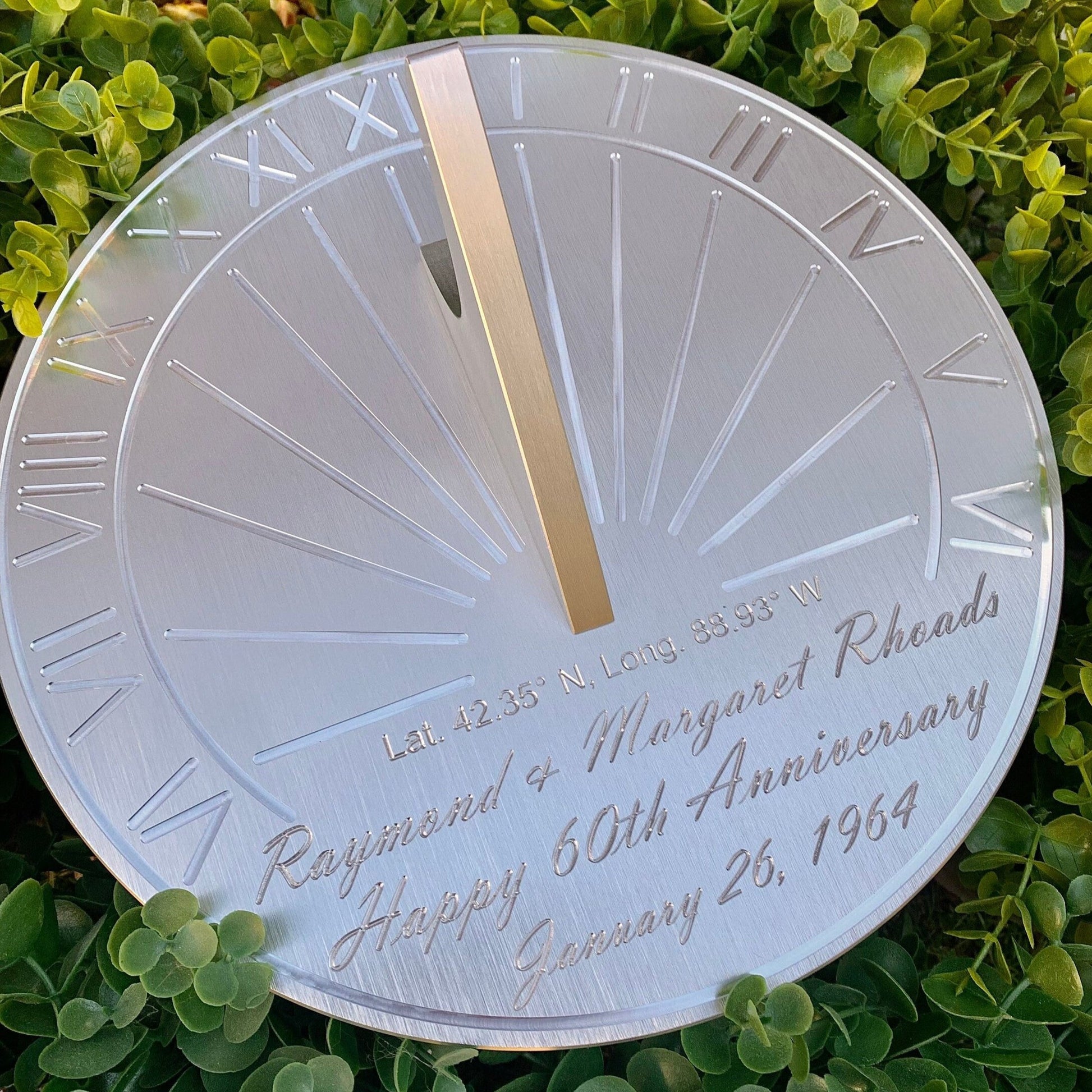 Diamond wedding gifts sundials displayed in garden, inspiring funny 60th wedding anniversary gifts.
