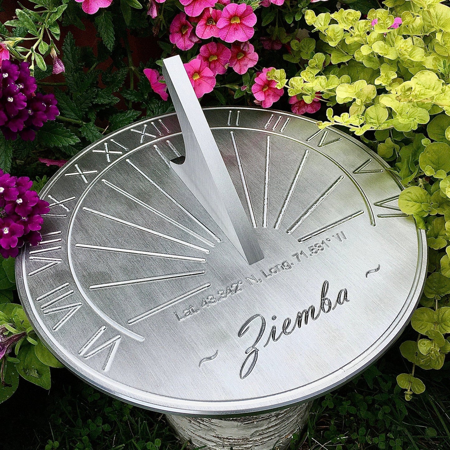Unusual first wedding anniversary gifts sundial in garden designed as 1st year relationship anniversary gifts. 