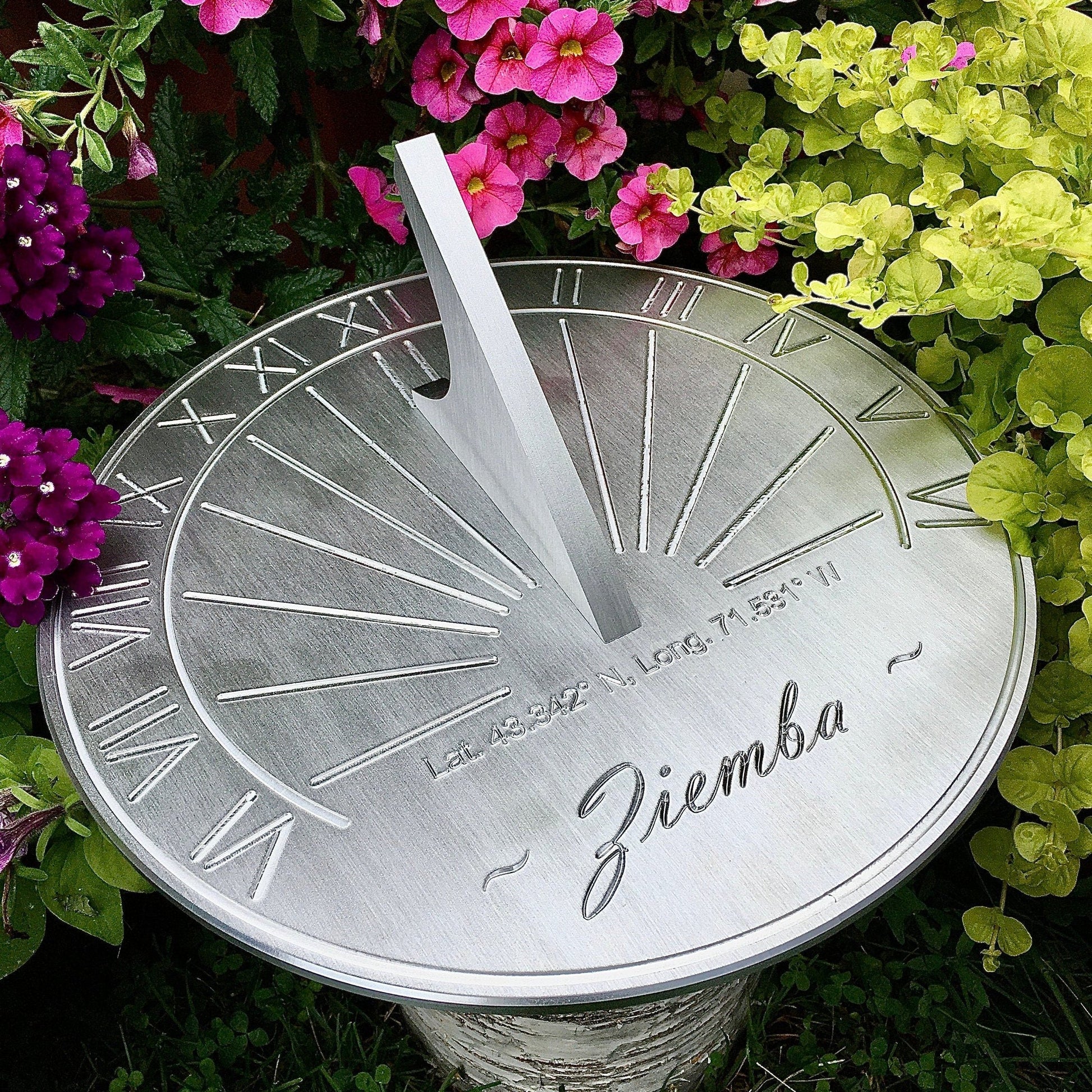 Unusual first wedding anniversary gifts sundial in garden designed as 1st year relationship anniversary gifts. 