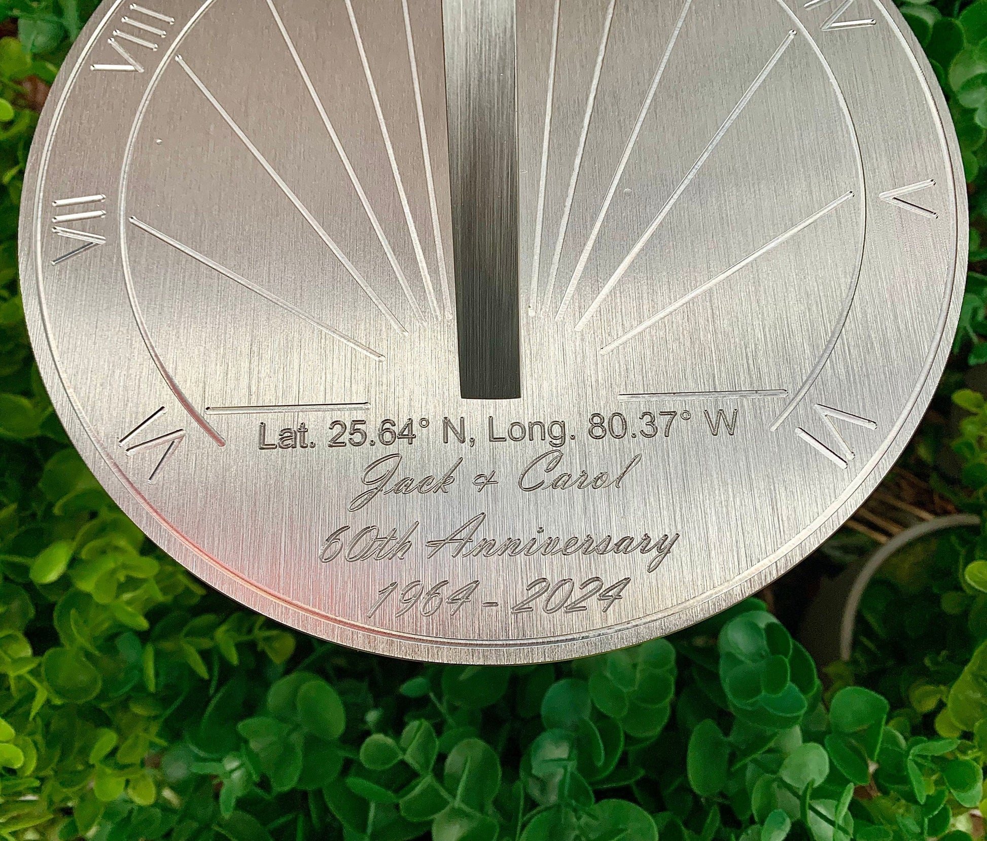 Mini 60th anniversary sundial displayed in garden, custom engraved as 60th wedding anniversary presents. 